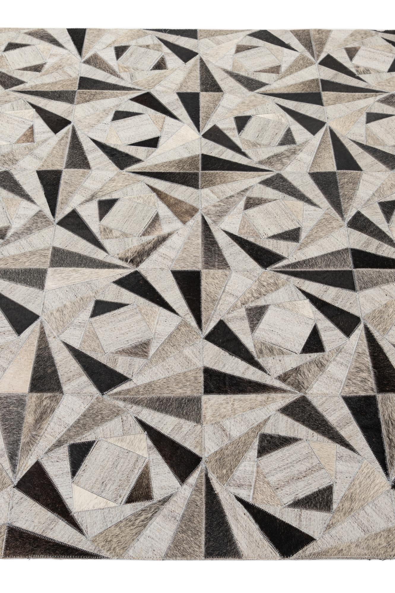 4' 11 x 7' 10 Cowhide - Patchwork Rug