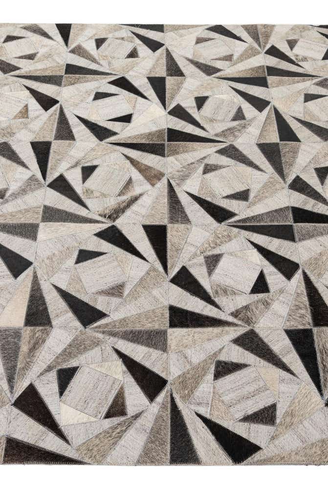 4' 11 x 7' 10 Cowhide - Patchwork Rug