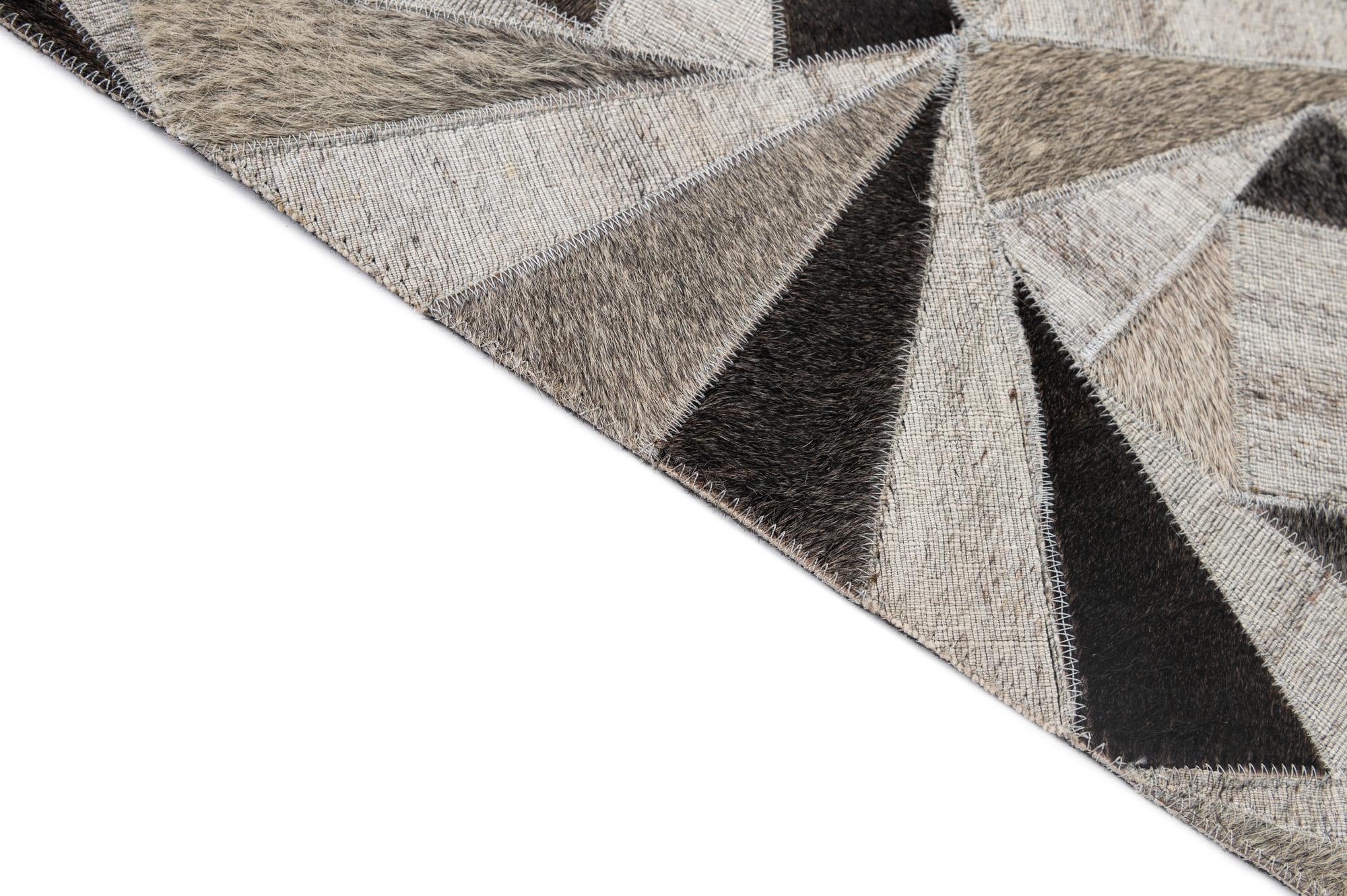 4' 11 x 7' 10 Cowhide - Patchwork Rug