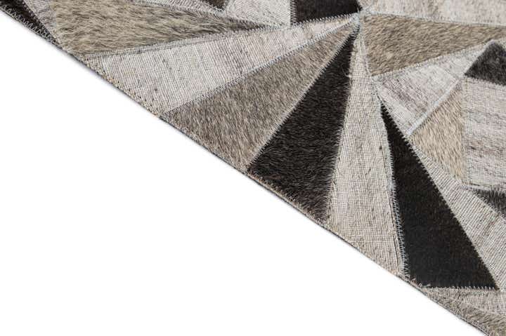 4' 11 x 7' 10 Cowhide - Patchwork Rug