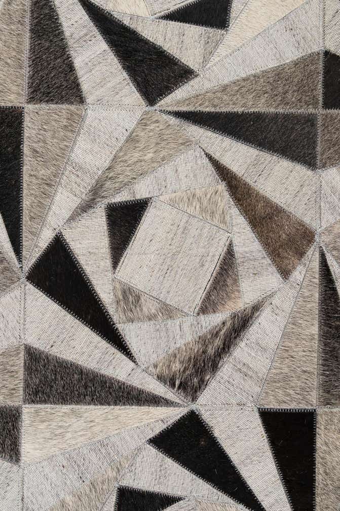 4' 11 x 7' 10 Cowhide - Patchwork Rug