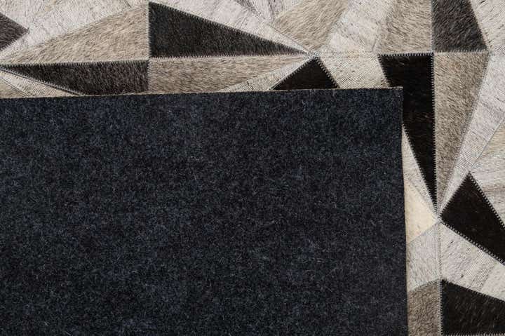 4' 11 x 7' 10 Cowhide - Patchwork Rug