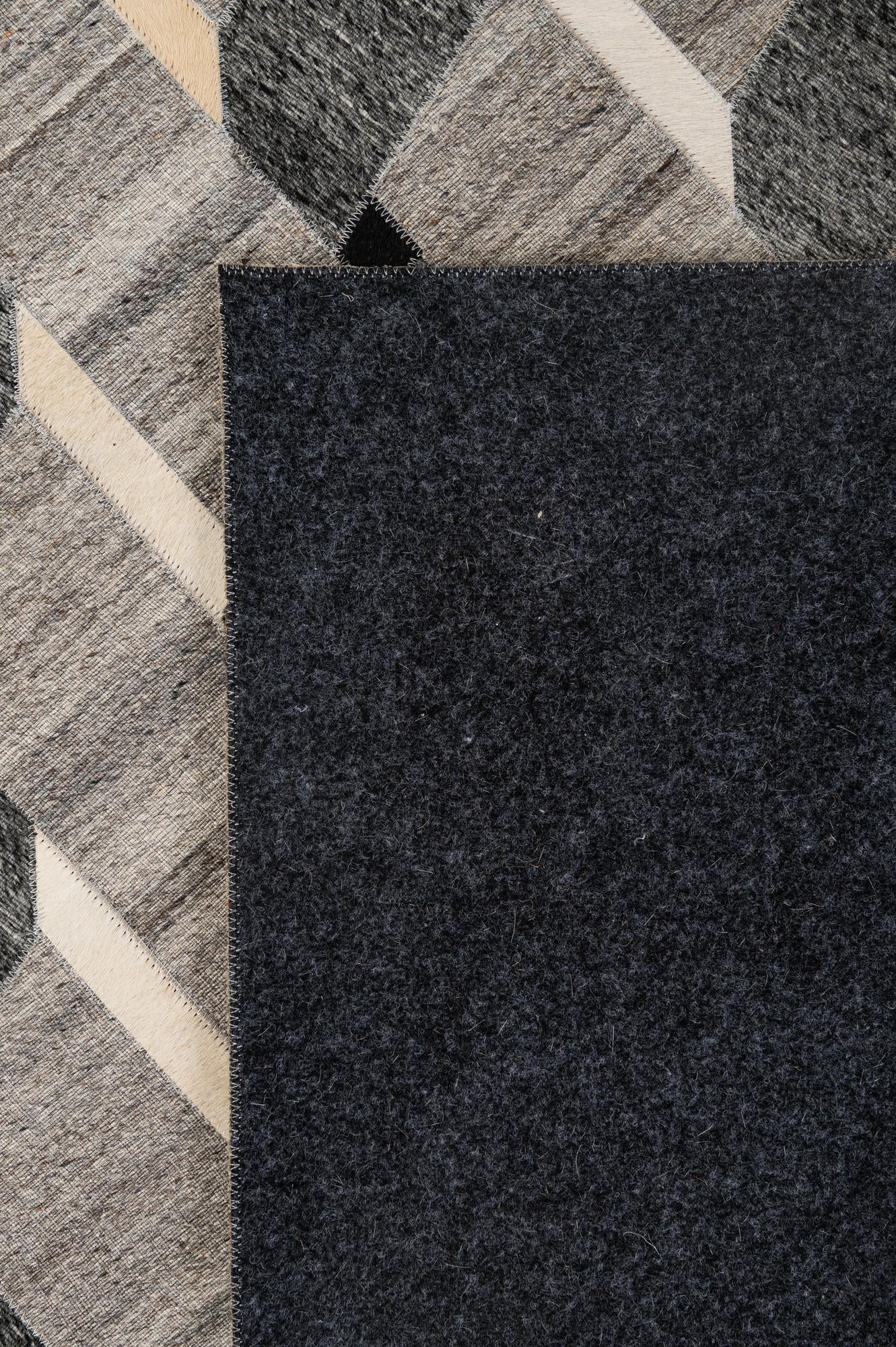 5' 2 x 7' 11 Cowhide - Patchwork Rug