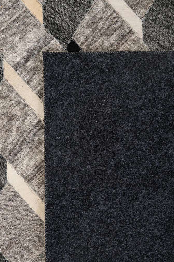 5' 2 x 7' 11 Cowhide - Patchwork Rug