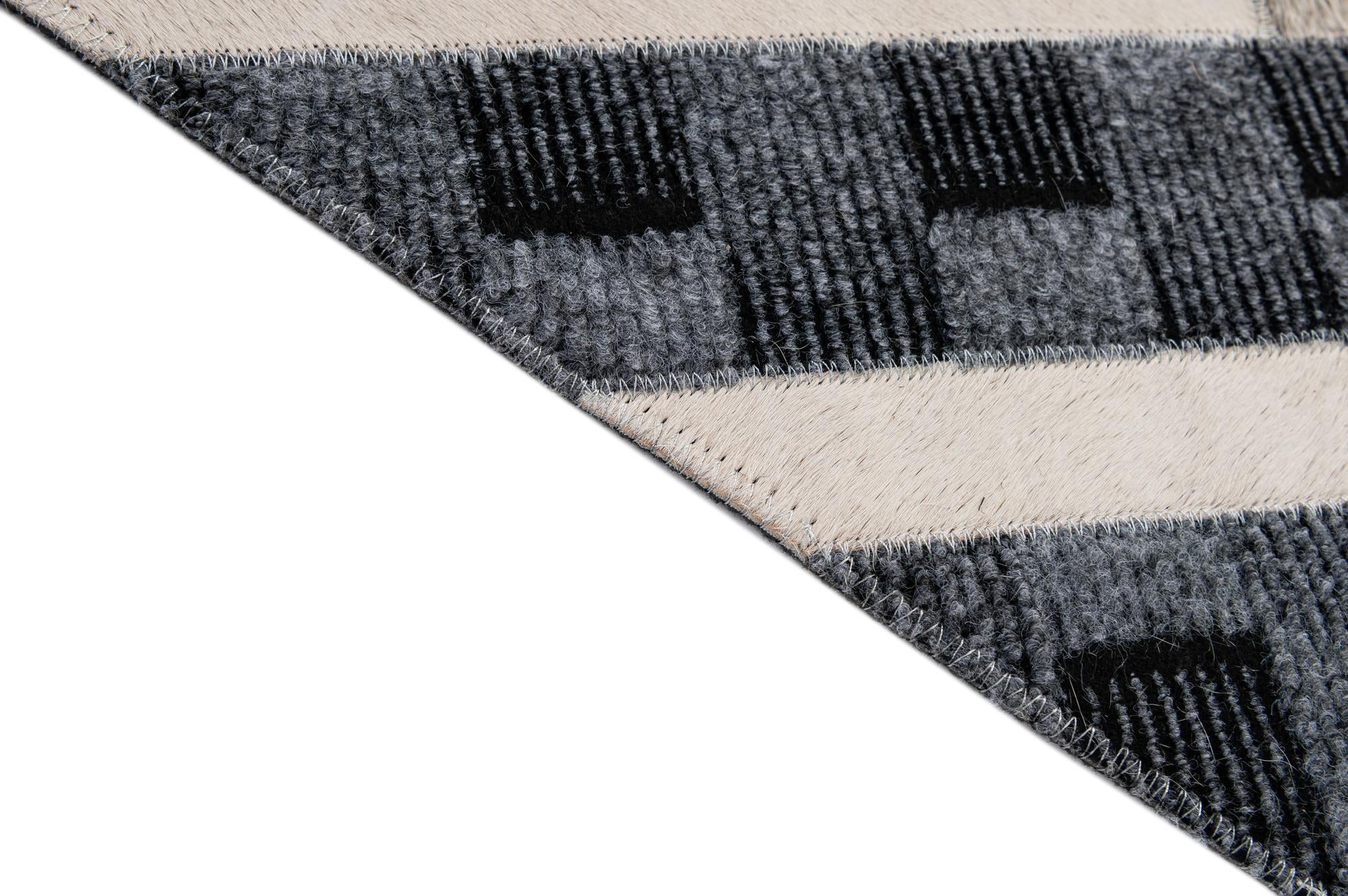 4' 11 x 7' 11 Cowhide - Patchwork Rug