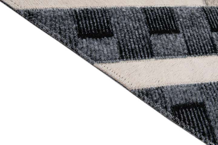 4' 11 x 7' 11 Cowhide - Patchwork Rug