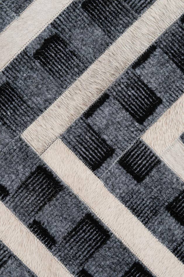 Detail image of 4' 11 x 7' 11 Cowhide - Patchwork Rug