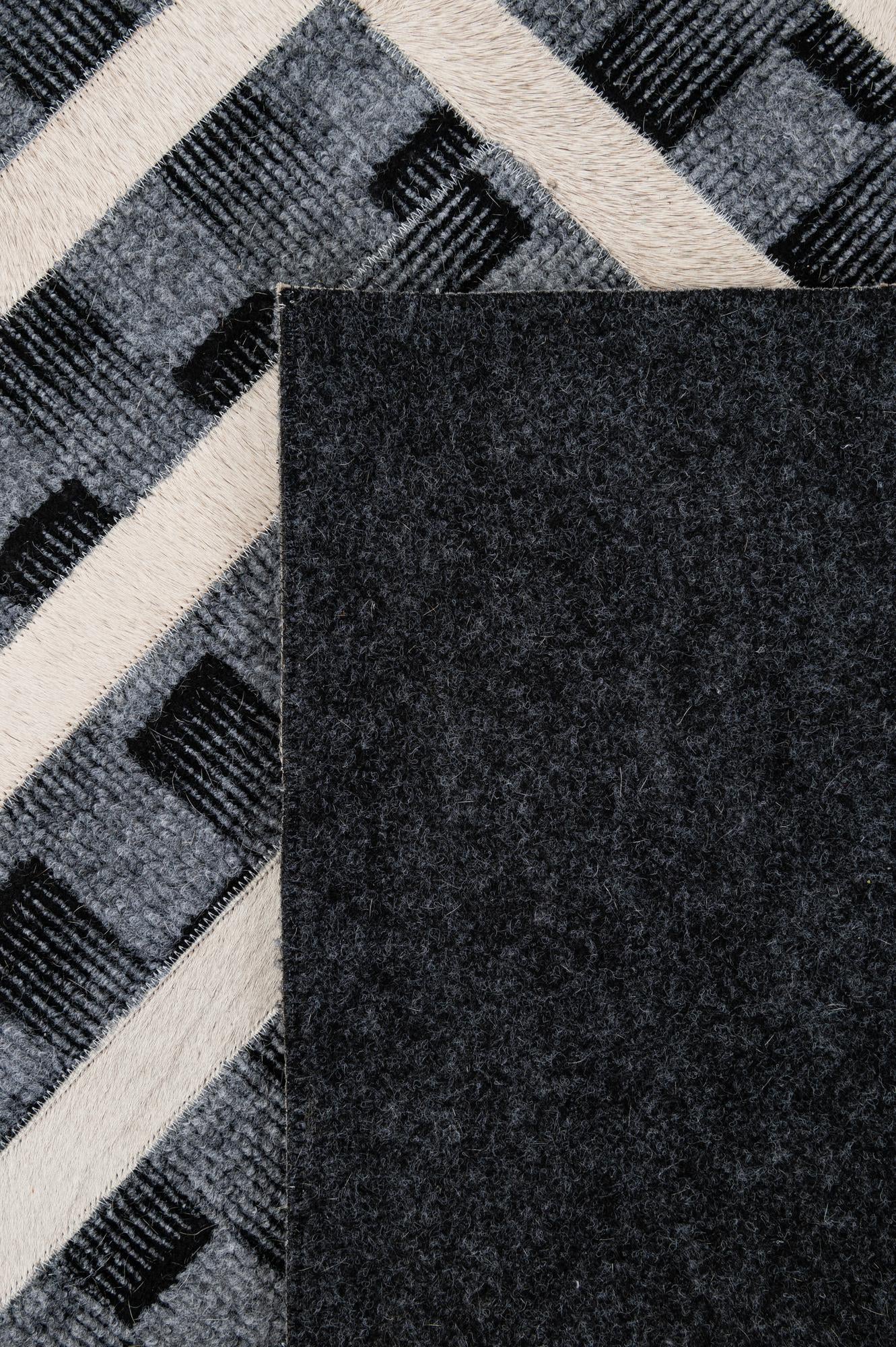 4' 11 x 7' 11 Cowhide - Patchwork Rug