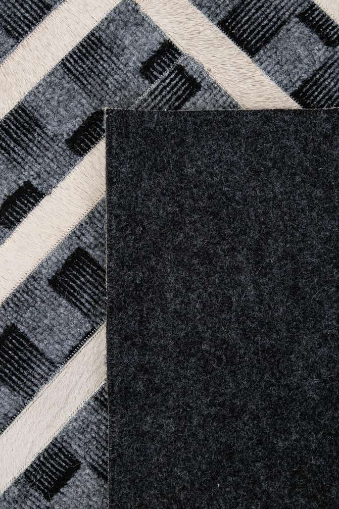 4' 11 x 7' 11 Cowhide - Patchwork Rug