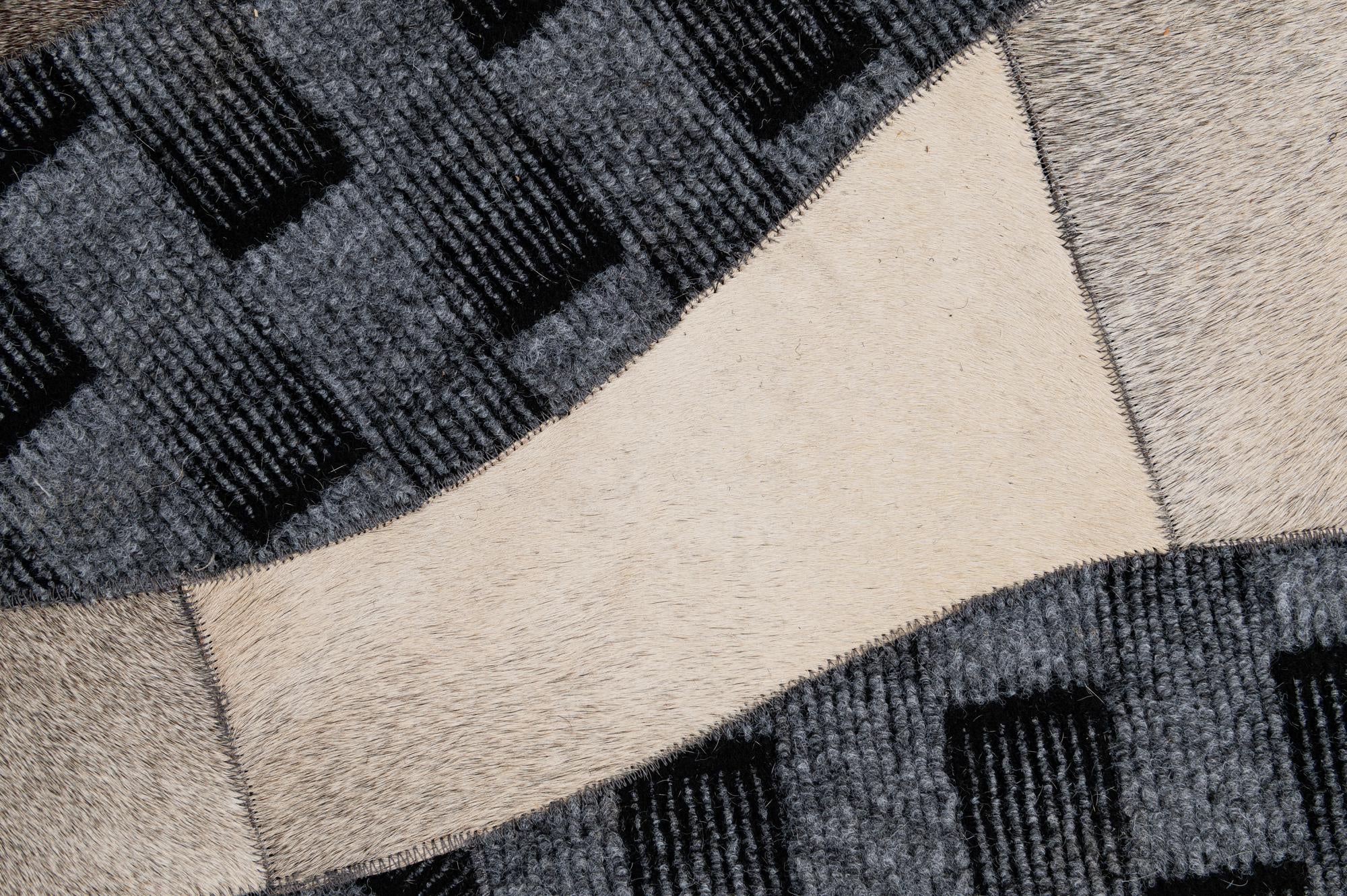 4' 11 x 8' 1 Cowhide - Patchwork Rug