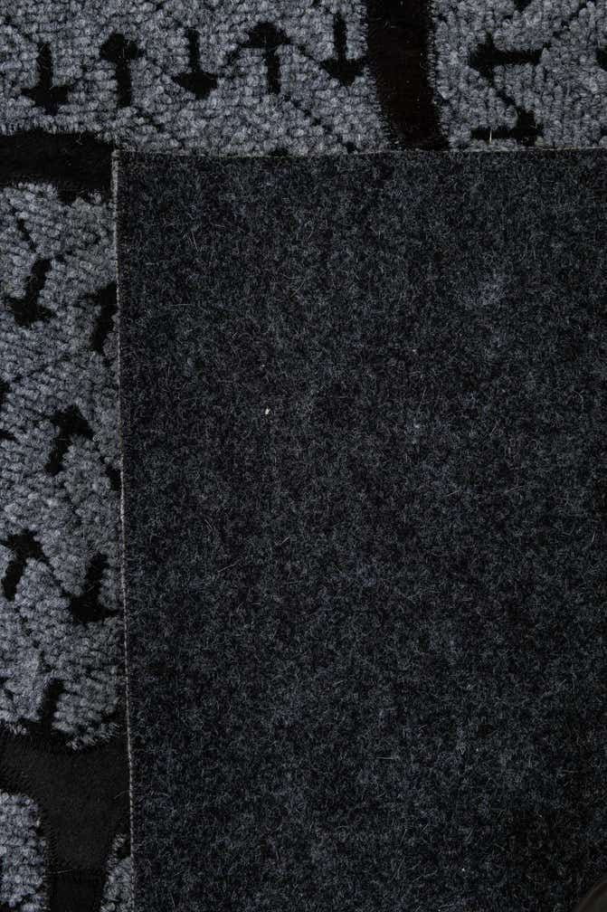 5' 2 x 8' 1 Cowhide - Patchwork Rug