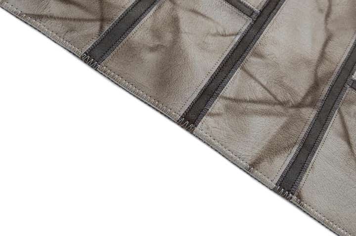 5' 2 x 8' 1 Cowhide - Patchwork Rug