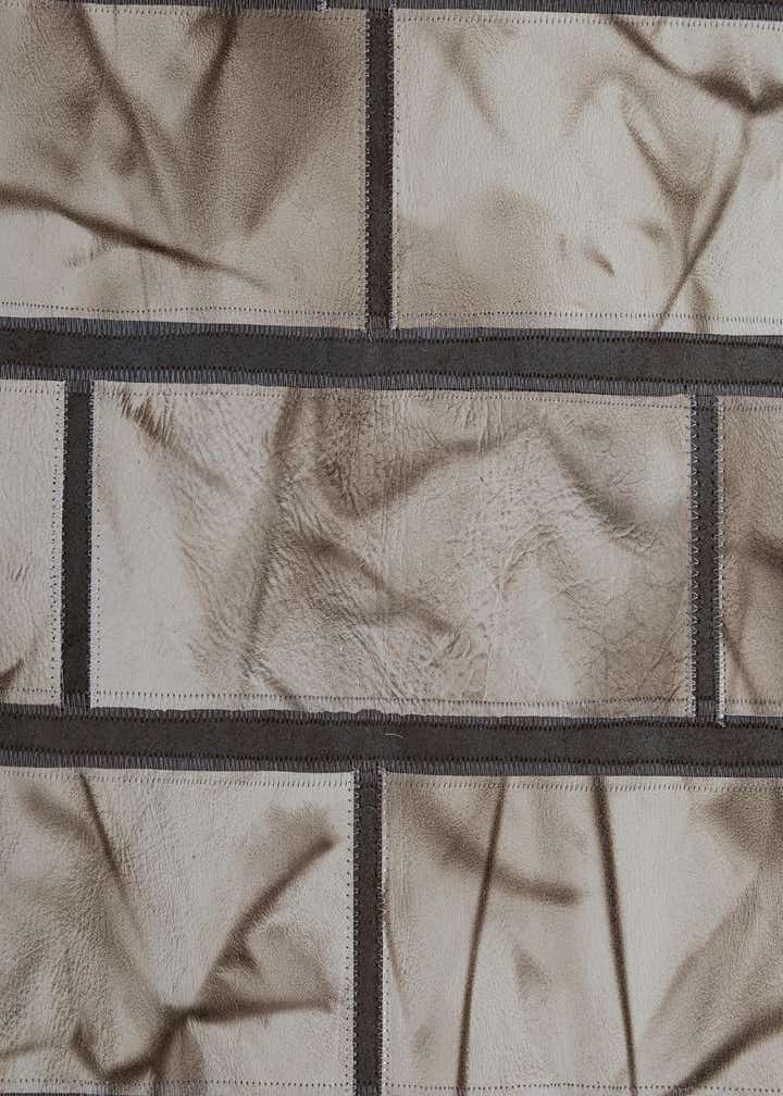 5' 2 x 8' 1 Cowhide - Patchwork Rug