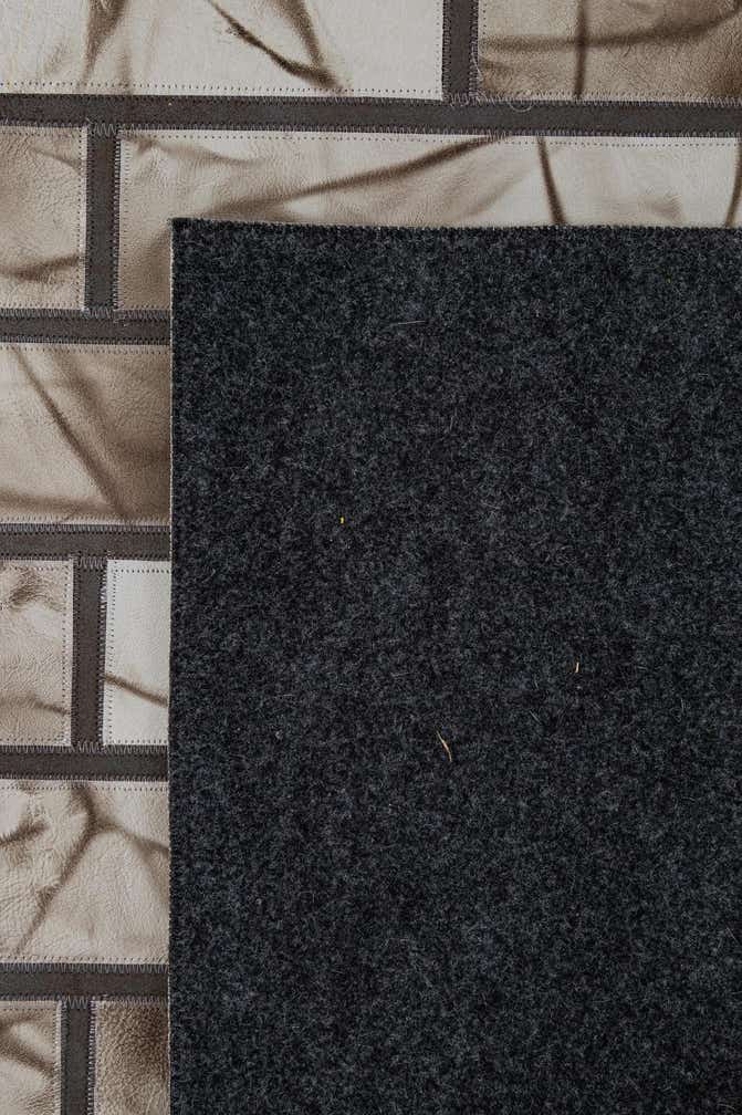 5' 2 x 8' 1 Cowhide - Patchwork Rug