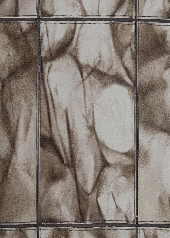 4' 11 x 7' 10 Cowhide - Patchwork Rug