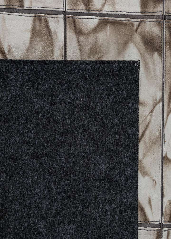 4' 11 x 7' 10 Cowhide - Patchwork Rug