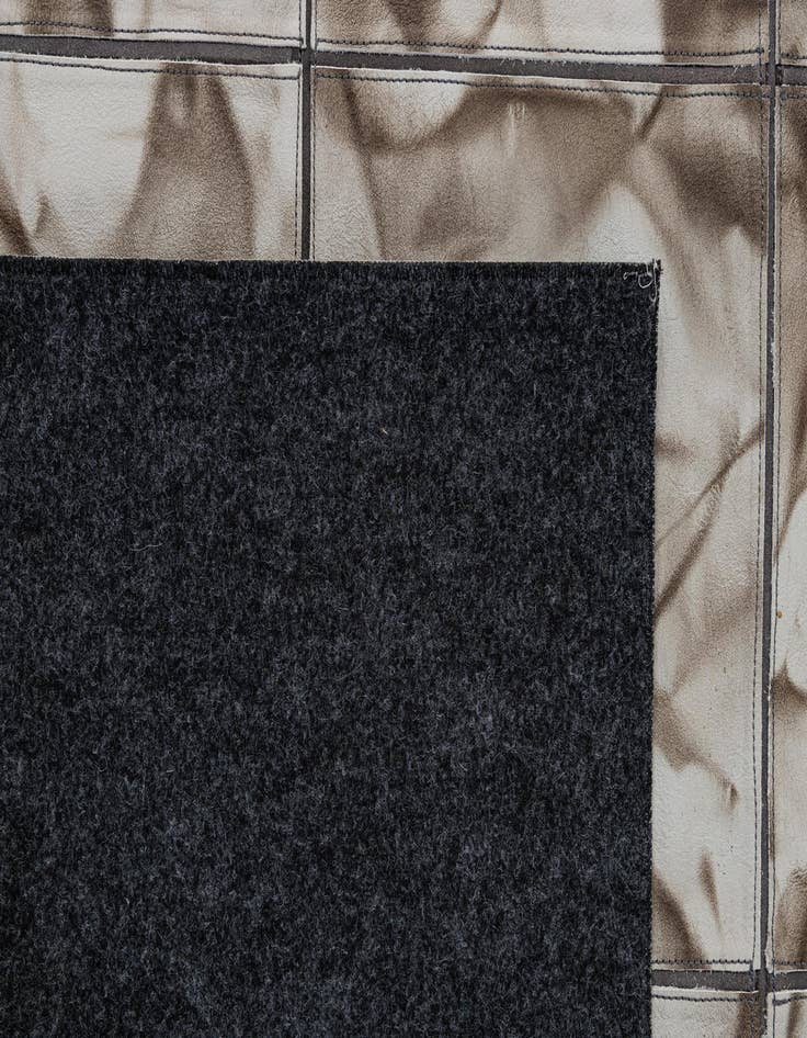 Detail image of 4' 11 x 7' 10 Cowhide - Patchwork Rug