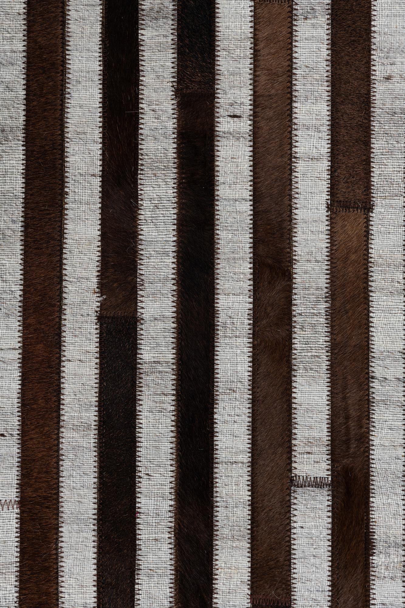 5' 1 x 7' 10 Cowhide Leather Rug