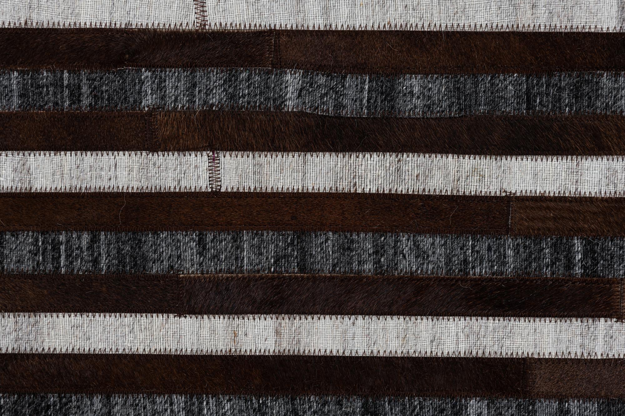 5' 1 x 7' 10 Cowhide Leather Rug