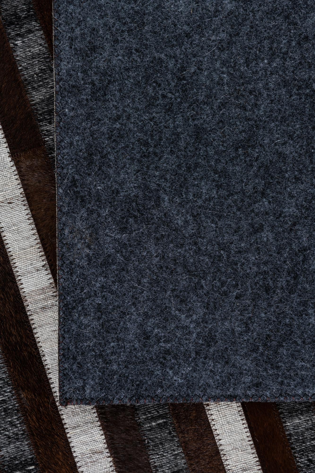 5' 1 x 7' 10 Cowhide Leather Rug