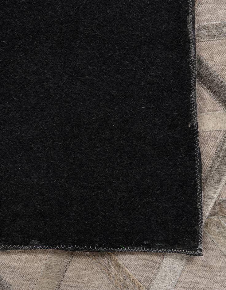 Detail image of 3' 10 x 5' 10 Cowhide Leather Rug