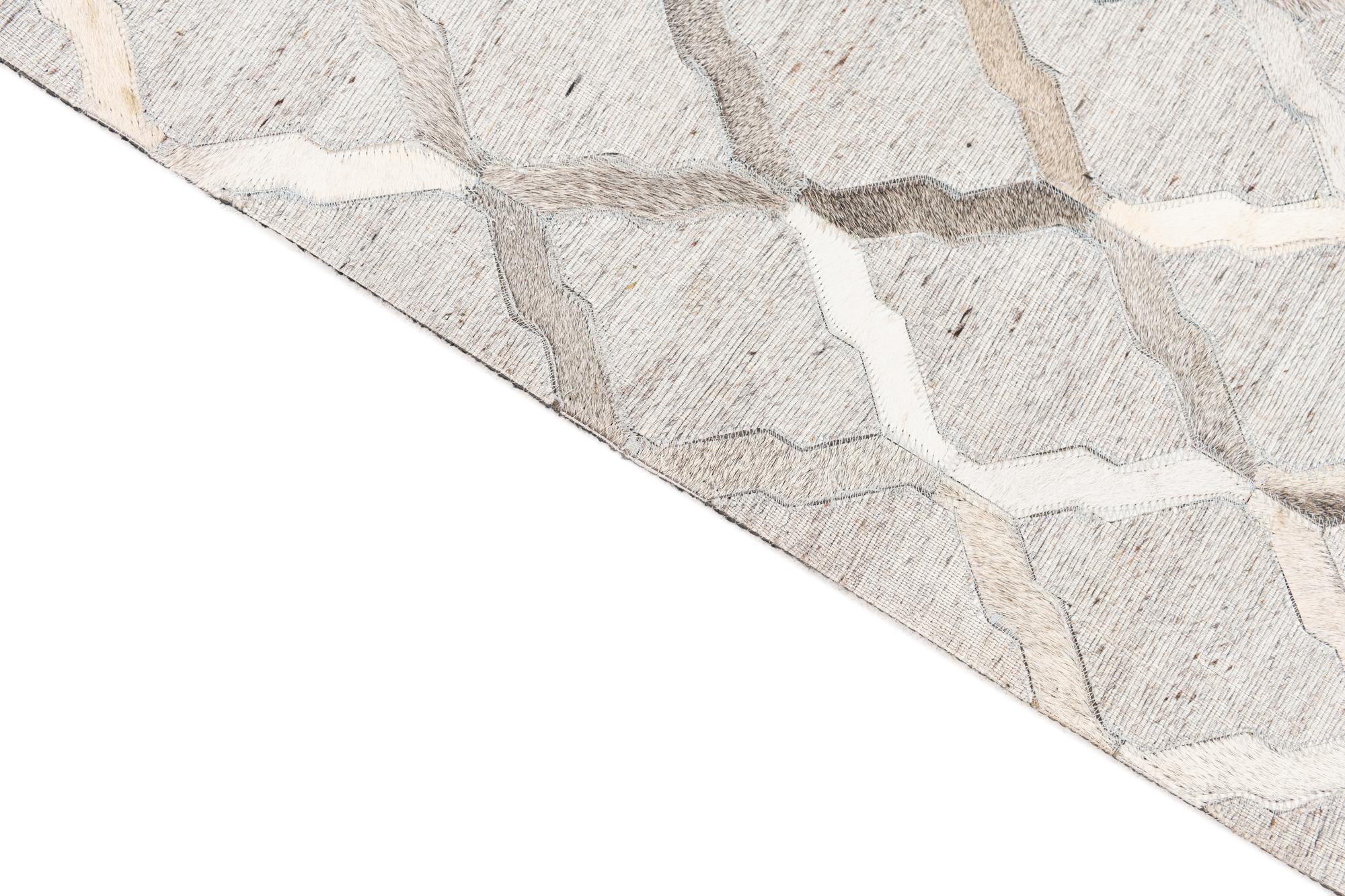 5' 1 x 7' 8 Cowhide Leather Rug