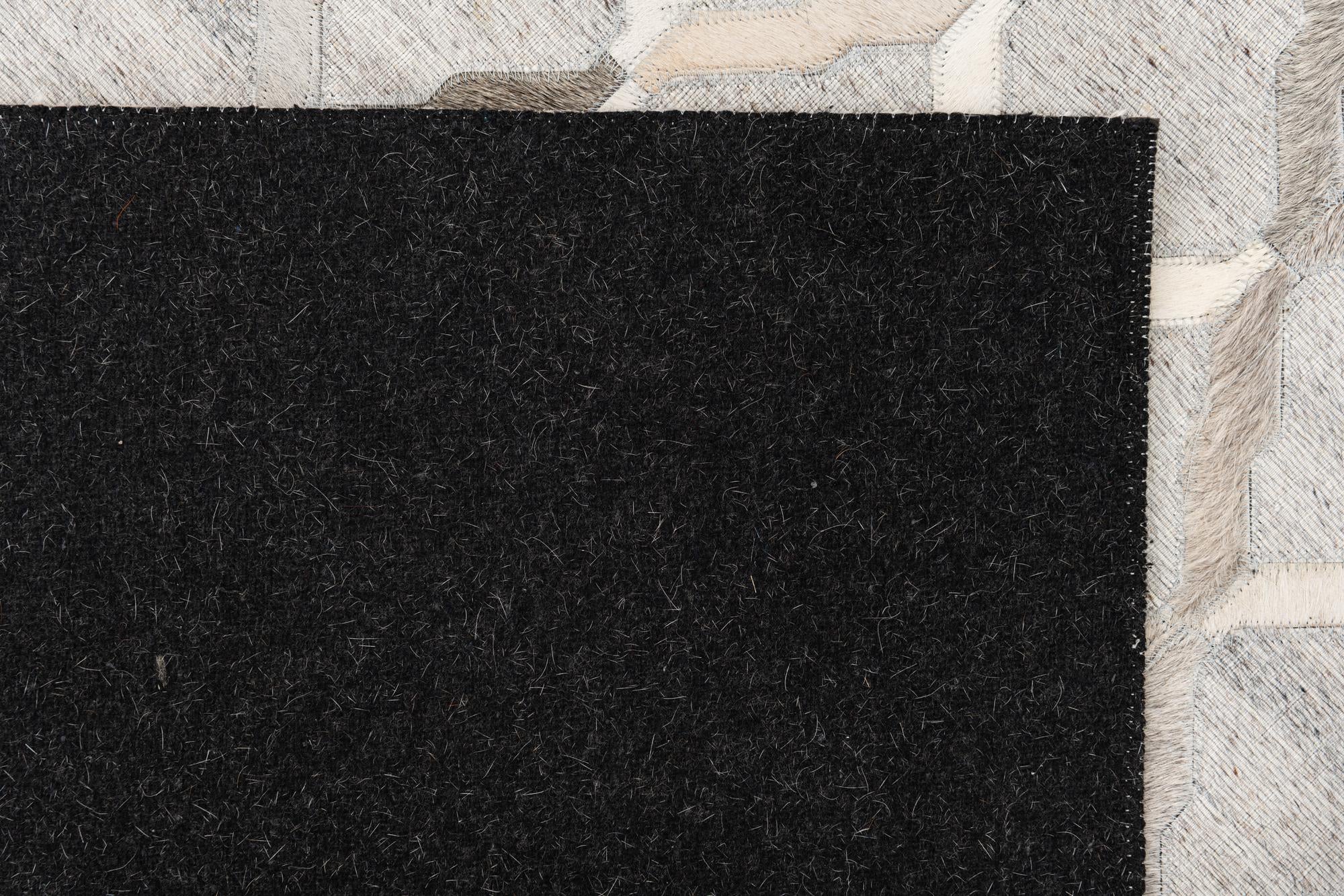 5' 1 x 7' 8 Cowhide Leather Rug