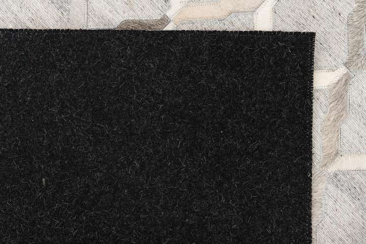 5' 1 x 7' 8 Cowhide Leather Rug
