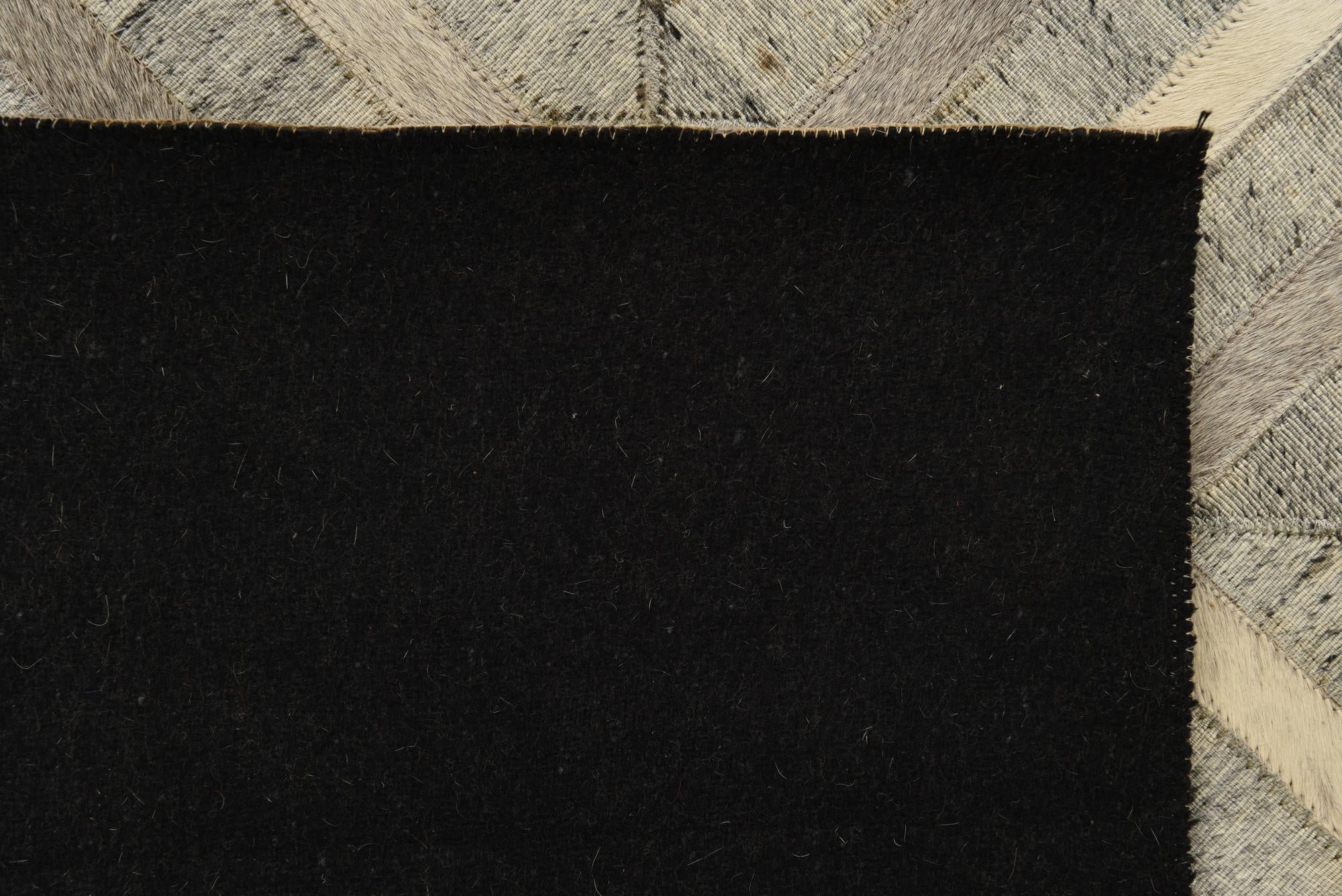5' 1 x 8' Cowhide Rug