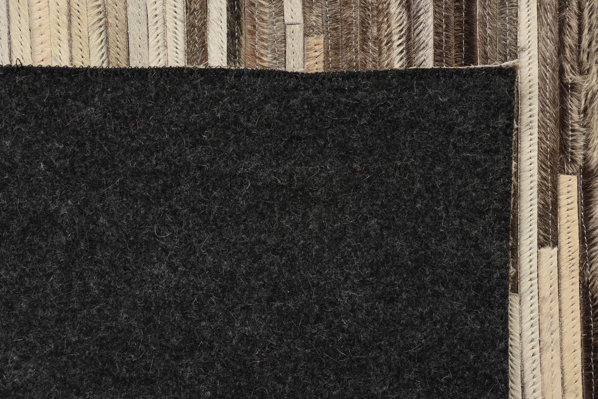 5' x 8' 3 Cowhide Rug