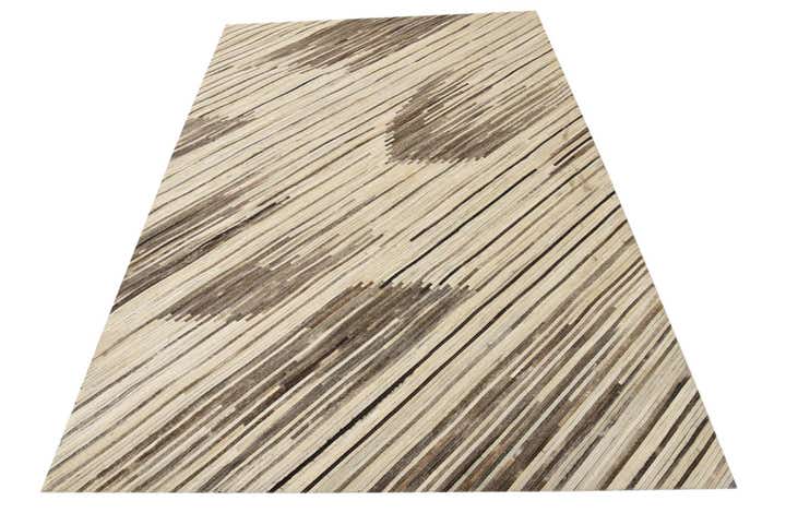 5' 1 x 7' 10 Cowhide Rug