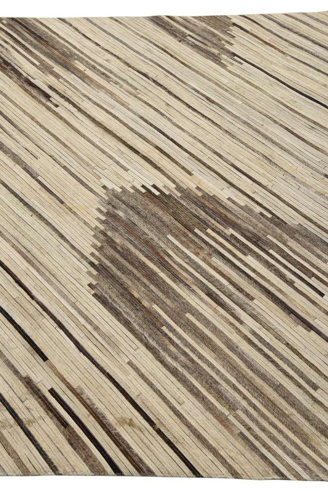 5' 1 x 7' 10 Cowhide Rug