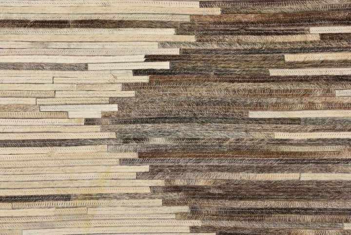 5' 1 x 7' 10 Cowhide Rug