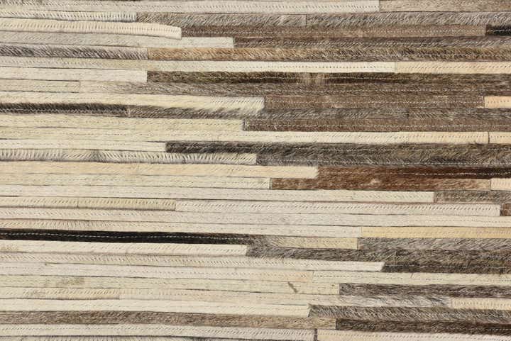 5' 1 x 7' 10 Cowhide Rug