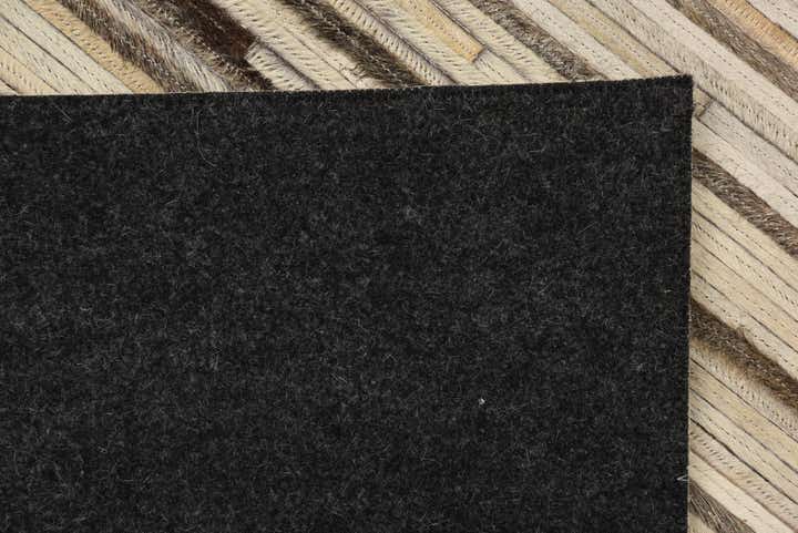 5' 1 x 7' 10 Cowhide Rug