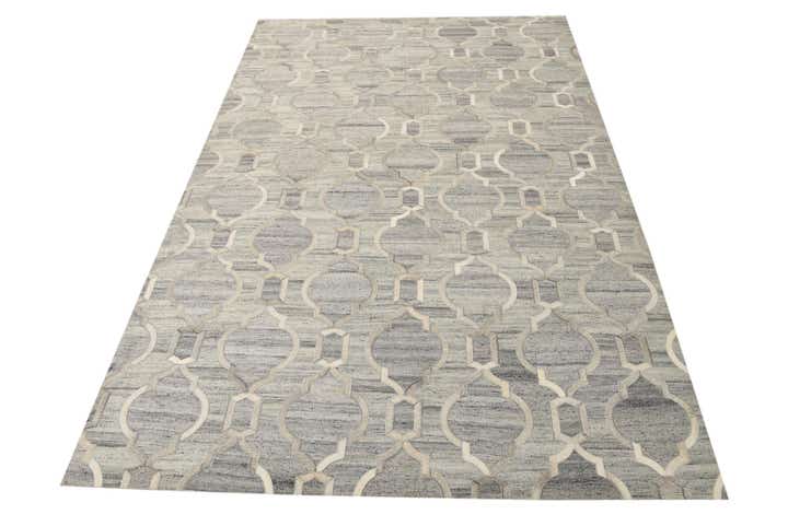 5' 1 x 7' 10 Cowhide Rug