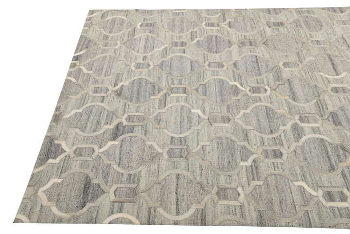 5' 1 x 7' 10 Cowhide Rug