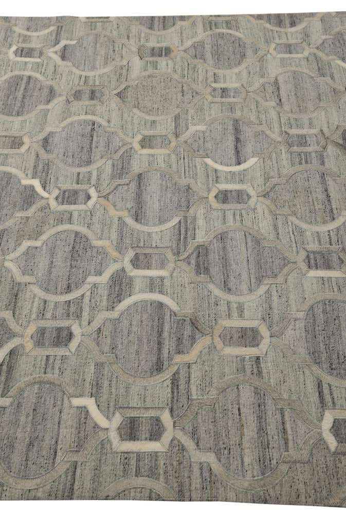5' 1 x 7' 10 Cowhide Rug