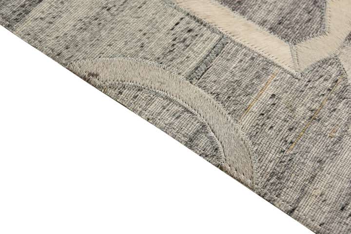 5' 1 x 7' 10 Cowhide Rug