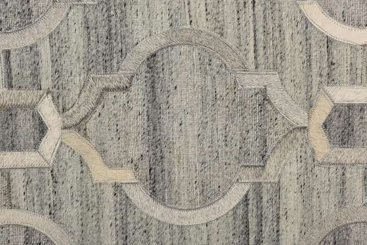 5' 1 x 7' 10 Cowhide Rug