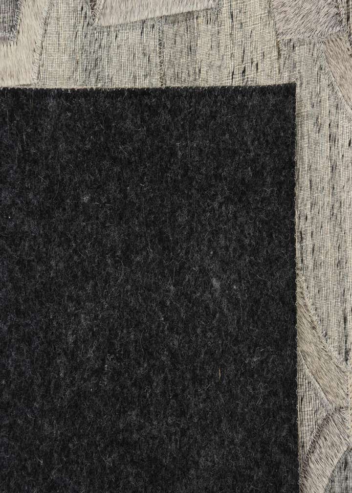 5' 1 x 7' 10 Cowhide Rug