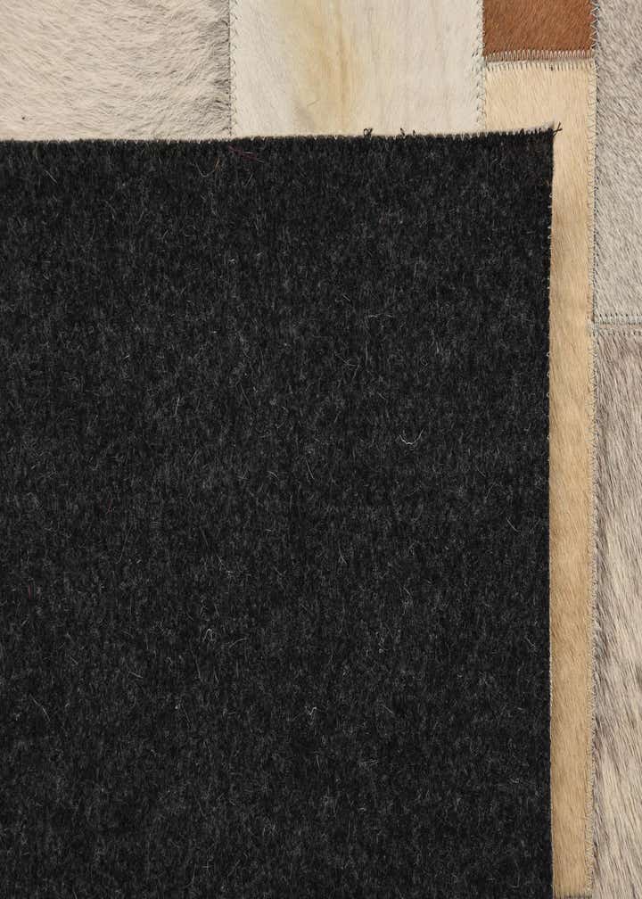 5' 1 x 8' 1 Cowhide Rug