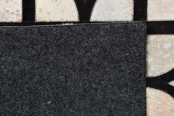 5' 3 x 7' 7 Cowhide Rug