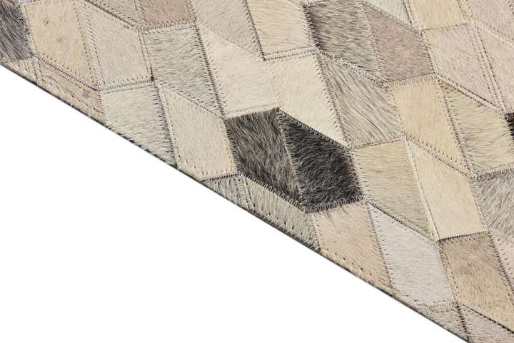 5' 2 x 7' 8 Cowhide Rug