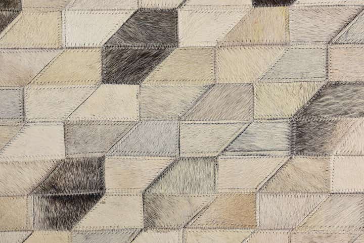 5' 2 x 7' 8 Cowhide Rug