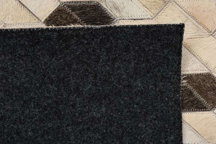 5' 2 x 7' 8 Cowhide Rug