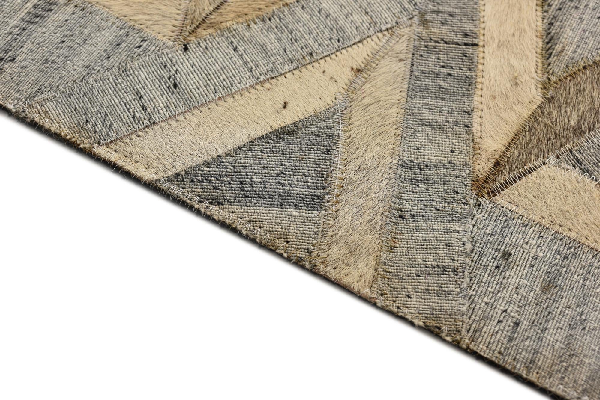 5' 2 x 7' 10 Cowhide Rug