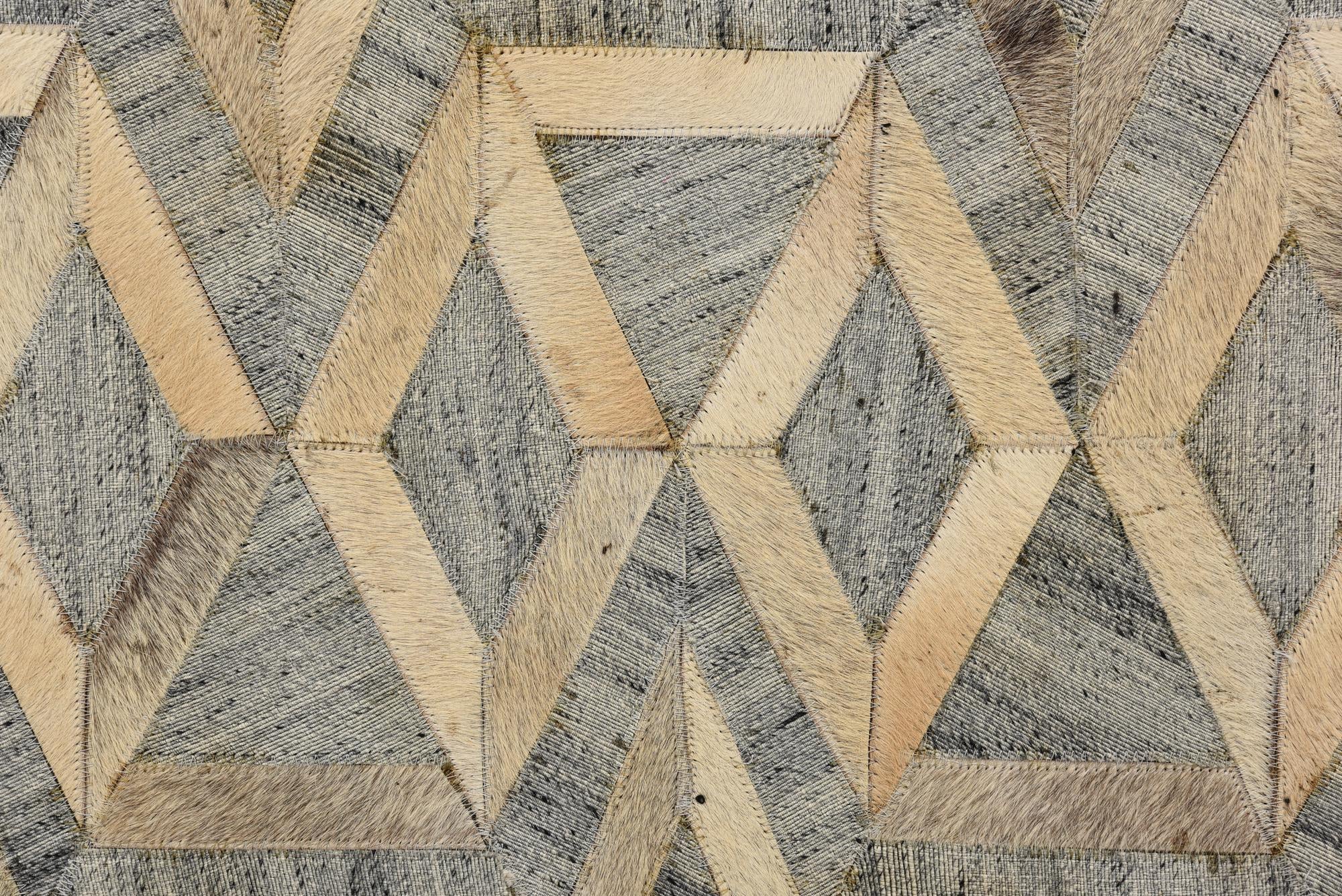 5' 2 x 7' 10 Cowhide Rug
