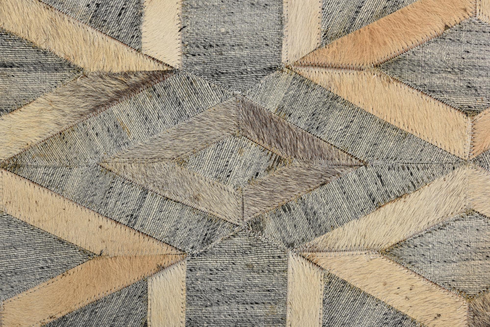 5' 2 x 7' 10 Cowhide Rug