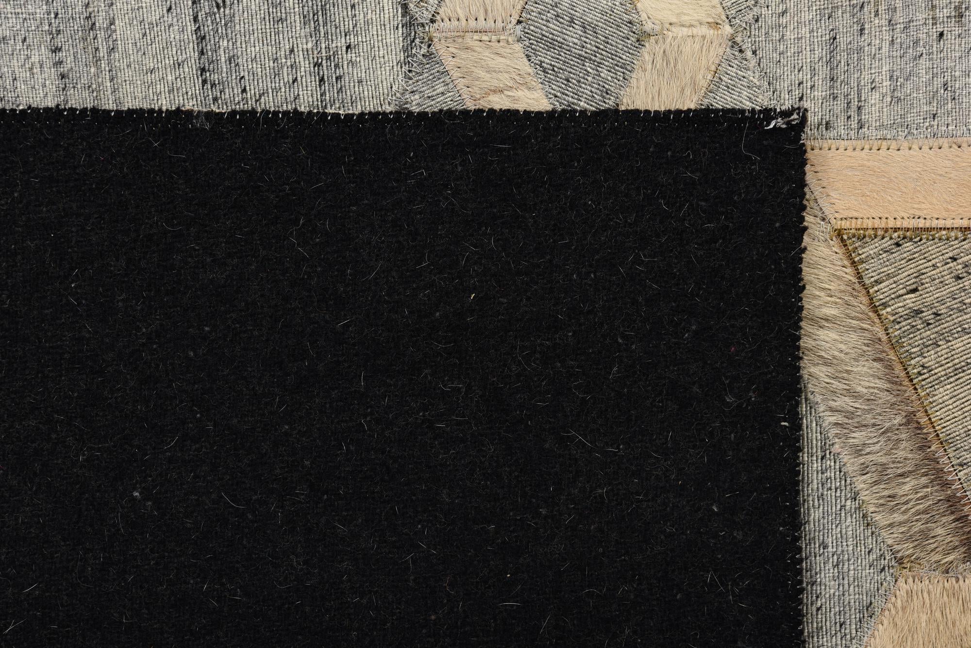 5' 2 x 7' 10 Cowhide Rug